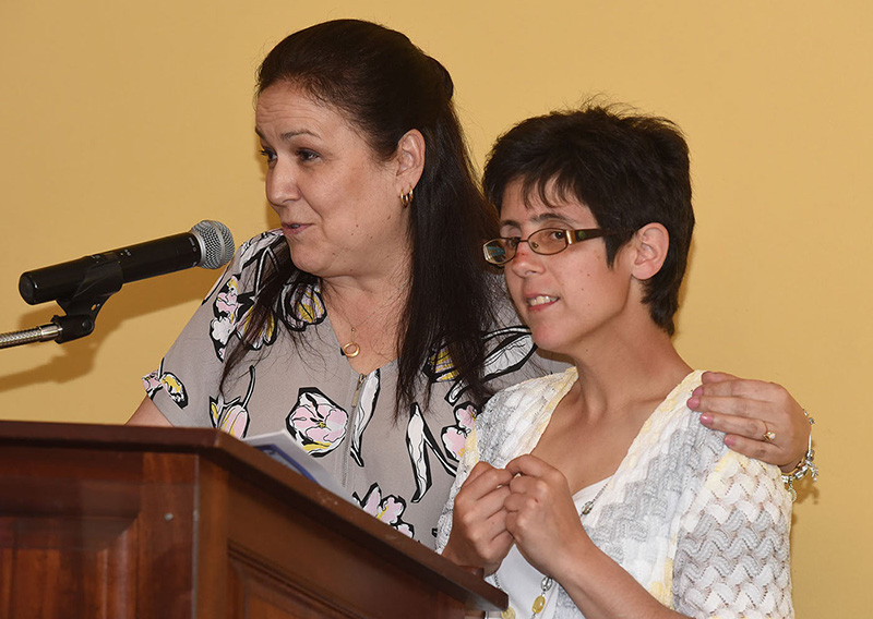 From left, Michele Rodriguez and Alison Heady speak at May 7th’s golf tournament dinner.