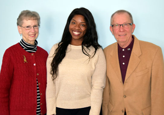 Shaunie Hylton (center) poses with Mary Moody (left) and Regis Obijiski (right)  after being honored as scholarship winner.